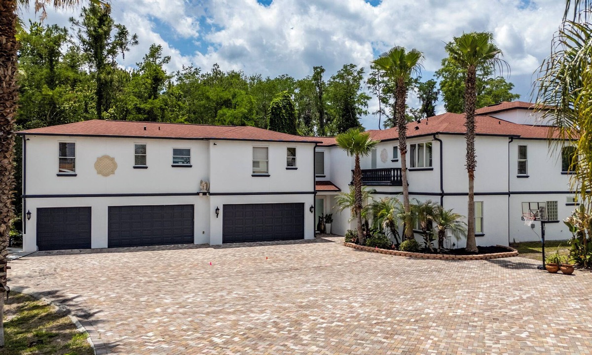 Orlando House | 5BR Lakefront Home w/Pool, Spa, Theater, Dock & Game Room