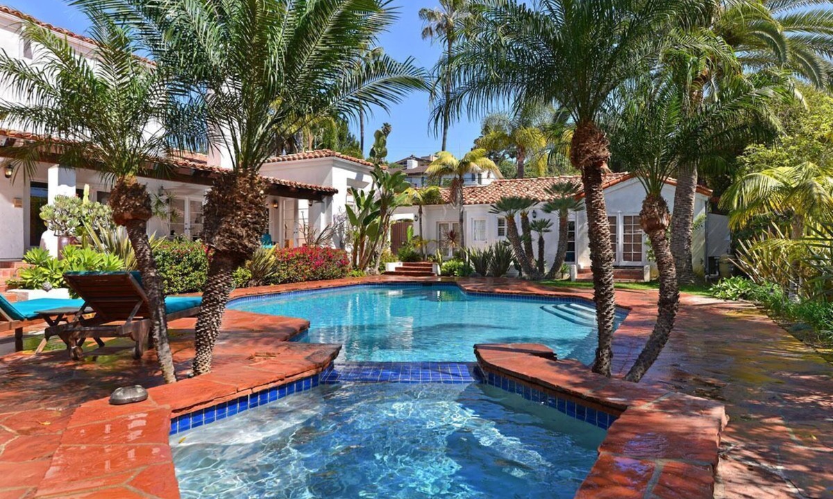 Muirlands Villa | Mediterranean magic in a sun-kissed tropical oasis with pool and pizza oven.