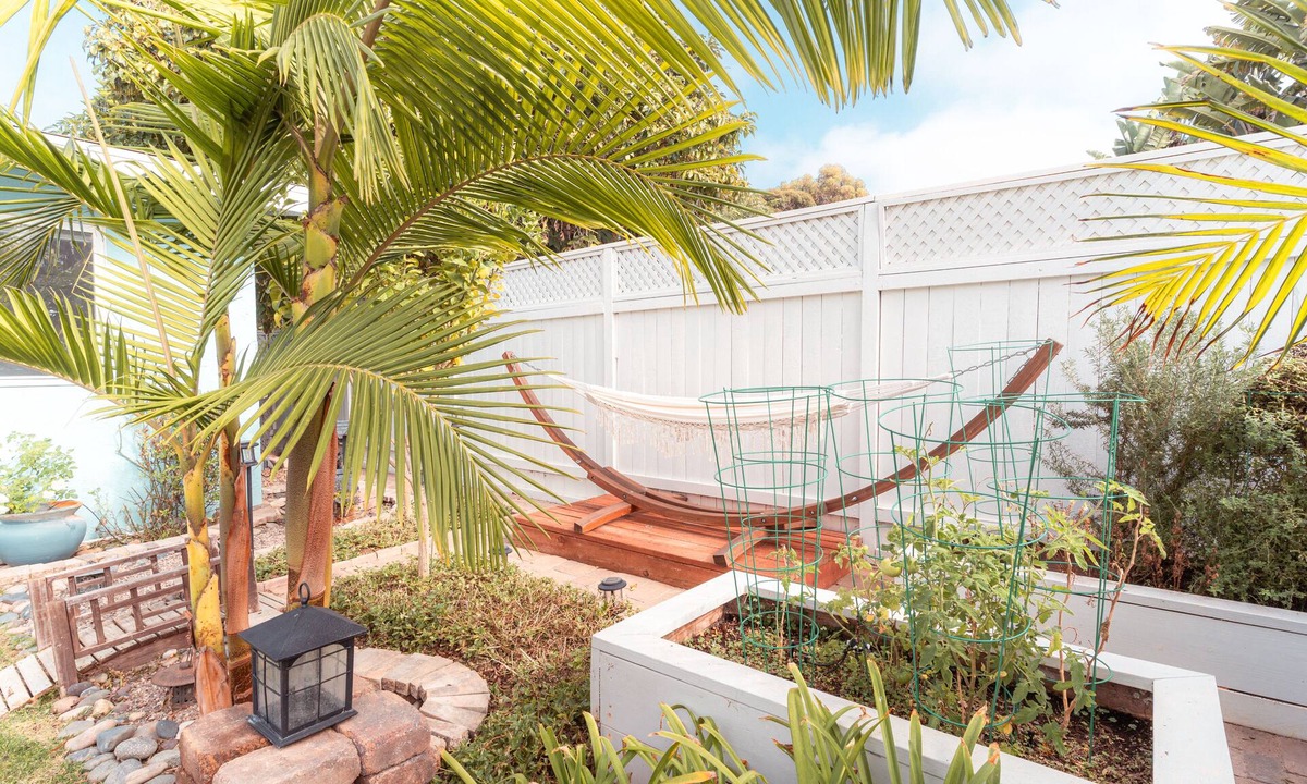 Carlsbad Village House | Relax by the fire pit and hammock. Enjoy the King bed en suite.