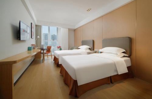 Jinzhou District Hotel | 慕往酒店大连开发区金马路店