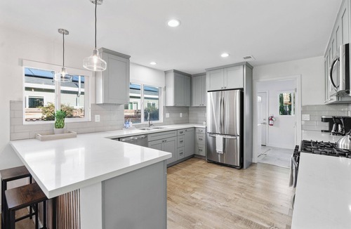 Townsite House | 1.5 miles the beach. Walk to the Pier! Parking and private backyard. Game room
