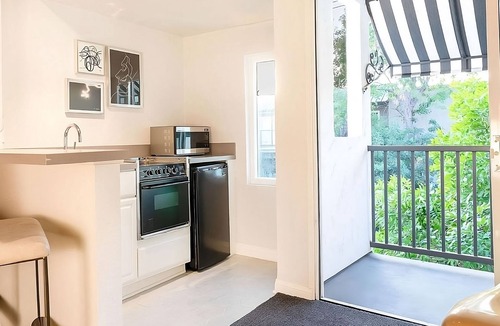 Norma Triangle Hotel | 3 Suites w/Access to Rooftop Lounge, Tennis Court, Pool & Local Hotspots