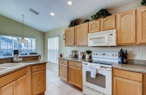 Solana House | 4 BDRM 3 Bath Home with Private Screened and Heated Pool- 15 Min to Disney