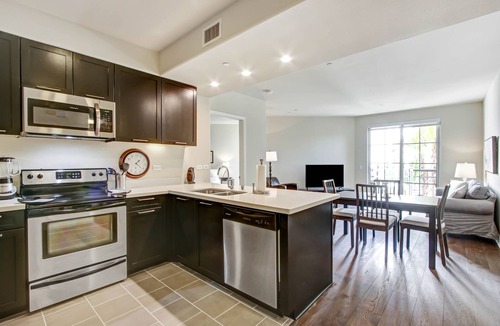 Downtown Apartment | 4th floor 2bedroom/2bath with private patio overlooking the meditation garden!