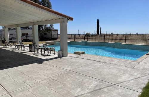 Merced House | 5145 Golf Rd, ADU, 40K Gallon pool on 60K SF land. Merced’s most exclusive area.