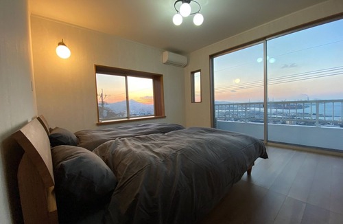 Kitakyushu House | A house with a night view and a healing wood stove - HH/Kitakyushu Fukuoka