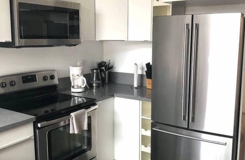University Heights Condo | CasaViva Loft Modern 2BR Garage Parking, In-Unit W/D & ADA Access, walk to Eats