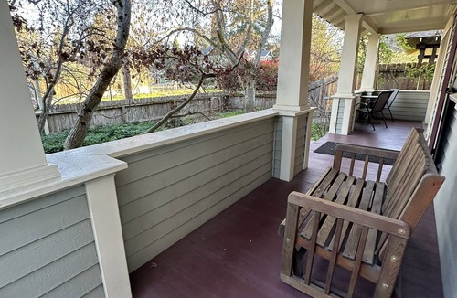 Jacksonville Cottage | Charming Jacksonville cottage with a front porch, full kitchen, off-street parking, and walkable access to Britt Festival, downtown shops, restaurants, and wine tasting. Features two bedrooms, two bathrooms, and peaceful historic charm.