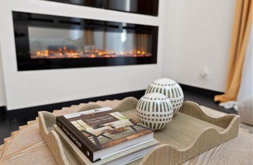 Cortez Hill Apartment | City Lights and Rooftop Nights by Rather Be Properties