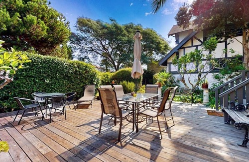 East Beach Apartment | Classic beach suite 1 block to ocean - fireplace, lovely patio, near downtown