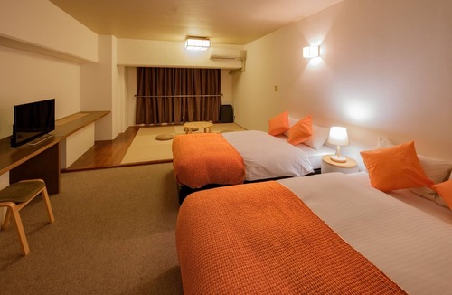 Miyazaki Hotel | Deluxe room with tatami space 2 semidouble beds/Miyazaki Miyazaki