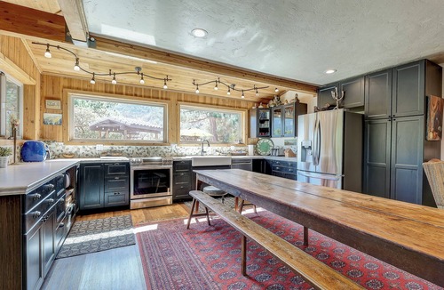 Idyllwild Cabin | Few properties in Idyllwild have a location as majestic and pristine as the Six Acre Sanctuary. Originally a girl scout camp, the land sits atop Idyllwild with beautiful views of Tahquitz Peak on one side and ocean views on the other.