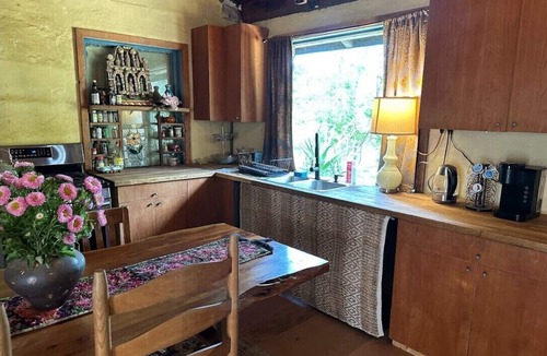 Topanga House | FRENCH 1914 STONE CABIN w/clawfoot bathtub, fireplace + private trails & creek
