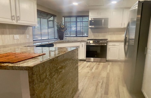 Lancaster House | Gated 4 BR 5 min to The BLVD and Convenient Access to Dinning A/C Parking