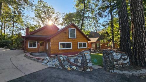 Bass Lake House | Knotty Pine Cabin with Artisan Stone Patio - Walk to Bass Lake