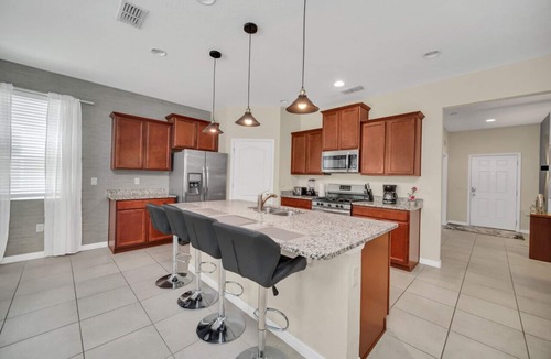 Loughman House | Luxury 6BR Pool Home in Solterra Resort