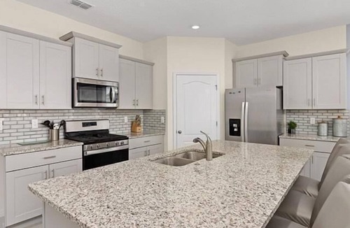 Loughman Villa | Luxury Family Villa in Solterra with Pool, Spa & Games Room Near Disney