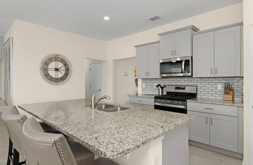Loughman Villa | Luxury Family Villa in Solterra with Pool, Spa & Games Room Near Disney