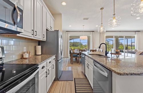 Loughman Villa | Luxury Villa on a great lot! Pool, Spa, Movie & Arcade. Close to Disney & Golf!