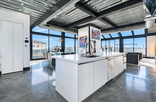 Silver Strand House | Marina del Rey Canal-Front Modern Estate w/Rooftop Pool, Spa & Theater