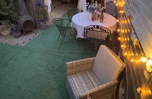 Ojai House | Ojai Pixie Suite spacious contemporary trailer, outdoor living area, rose garden