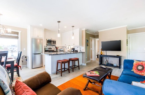 West Newport Apartment | Perfect Spot! 1 block to beach, garage, private deck, bikes & beach toys!