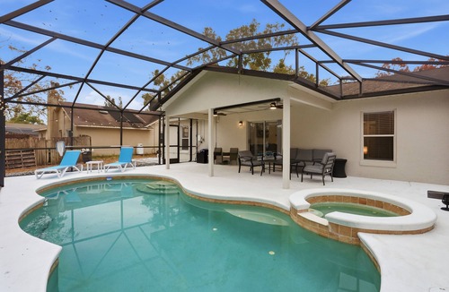Sunridge Woods House | Private pool, spa, and game room near Disney