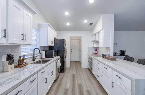 Clovis House | Relax & Play in Clovis! 4BR w/Hot Tub, Game Room, Firepit, Close to Hospitals