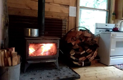 Nevada City Cabin | Rustic Woodland Log Cabin with Wood-Burning Stove in Nevada City, California