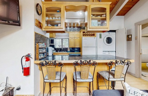 South Lake Tahoe Condo | Slopeside alpine condo with gas fireplace, shared hot tub-at base of Heavenly Lodge