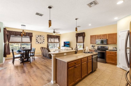 Watersong House | Southfacing heated pool and spa home in Watersong close to Disney attractions