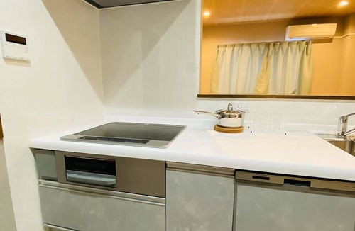 Minato House | Spacious 105-square-meter Family Home · 4 minutes to Bentencho · 9 minutes to USJ · Sleeps 8
