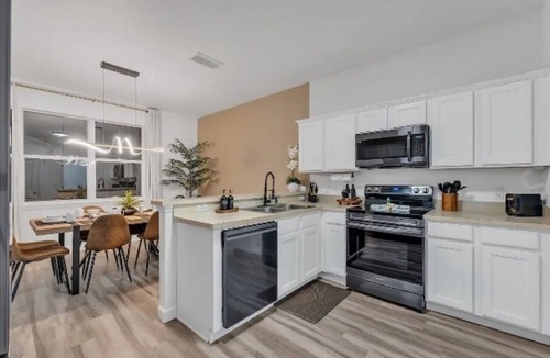 Sandy Ridge House | Spacious 4-bedroom Home in Davenport with Pool Heat Close to Disney!