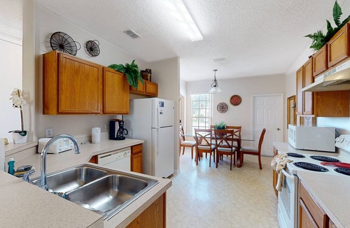Sunset Ridge House | Spacious home with heated pool, foosball, pool table, washer/dryer, & central AC