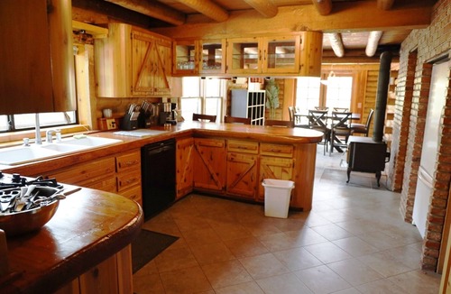 Fern Valley Cabin | Stay in this unique Mountain Retreat "Cougar Lodge", nestled in the shadow of color-soaked San Jacinto mountains. Our cabin is just a short drive to town center. Spacious 5-bedroom log cabin with two living rooms and a huge game area with Pool Table,