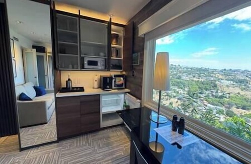 Hollywood Hills West Apartment | STUDIO 1080 HOLLYWOOD: Jetliner DTLA Views Private Hillside Studio King Bed