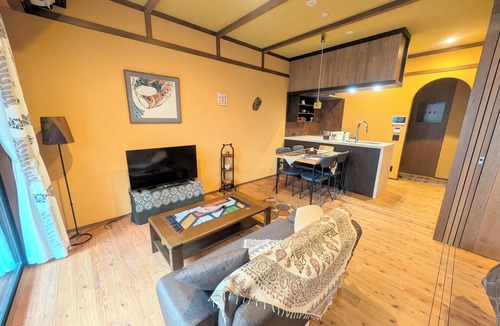 Minamisenba Apartment | Stylish Apartment with Balcony, Walk to Dotonbori, Shinsaibashi, & Kuromon Mkt
