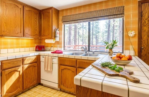 Black Bart Cabin | Tahoe Cabin with Stone Fireplace, 2-Car Garage & Fenced Yard — Steps to the River