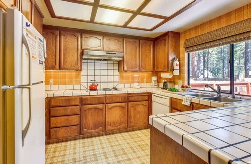 Black Bart Cabin | Tahoe Cabin with Stone Fireplace, 2-Car Garage & Fenced Yard — Steps to the River