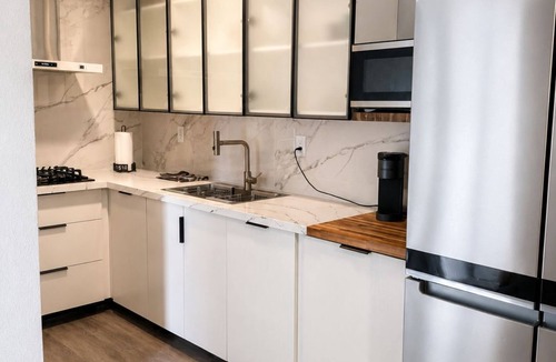 Buena Ventura Lakes Apartment | The Ember Suite l Designer Guest House