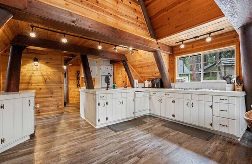 Shaver Lake Cabin | This one-of-a-kind A-frame cabin is full of mountain charm! Short walk to all of the shops, restaurants, and the lake!