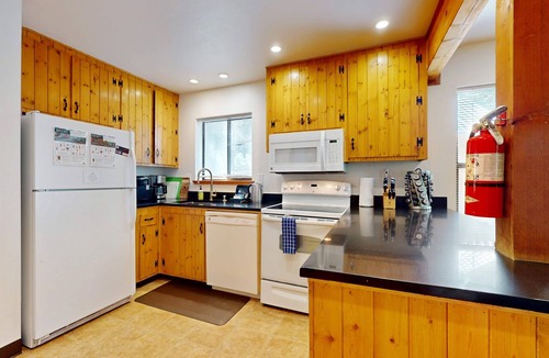 Truckee House | Updated home on quiet street with gas fireplace, shared hot tub, pool, & more