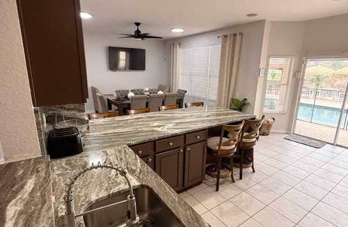 Windsor Hills Villa | YOLO HOUSE - WINDSOR HILLS : LUXURY TIKI BAR & BBQ : ALL DAY SUN :NEAR DISNEY