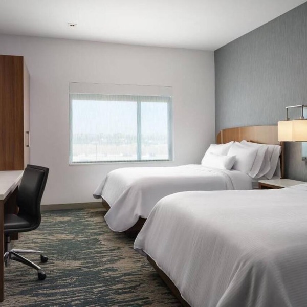 Walk to Disney - Stylish Suites with Pool, Free Wi-Fi and Breakfast