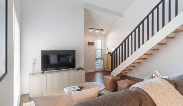 2 bed 2 bath condo with washer & dryer, parking garage, and office space