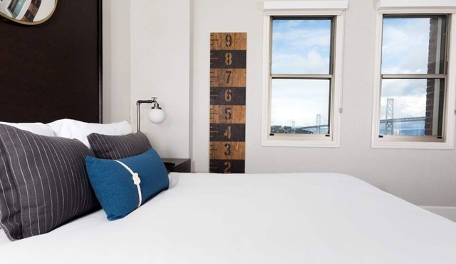 Bay View Room w/Living Area | Stay Close to Downtown