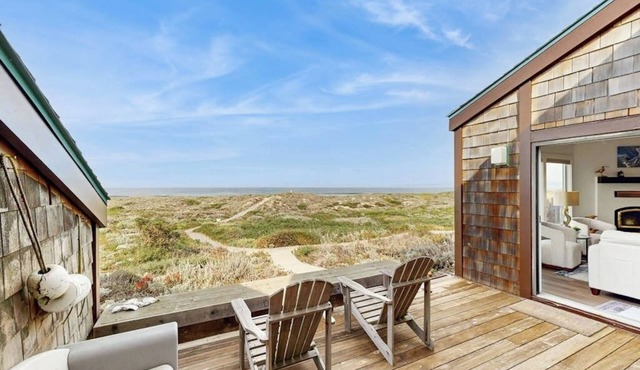 Beachfront condo with private patio, beach access, shared pool & hot tub.