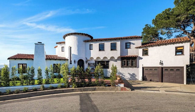 Cazador Castle: Spanish Revival Estate with Panoramic Views and Private Grounds
