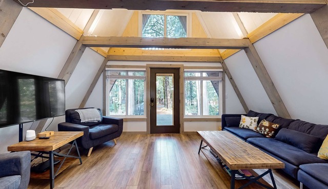 Dog-friendly A-frame near the river with game room, firepit, wood stove, & grill in Sandy