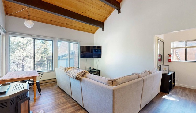 Dog-friendly snowbird escape with pool, hot tub & sauna access, & woodstove